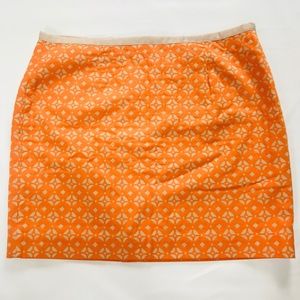 Fossil NWT orange & tan lined skirt. Size 8